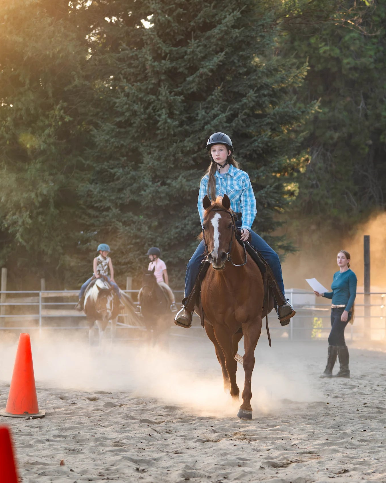 Riding student and chestnut horse riding an equitation pattern from Circus Unicorn's beginner lesson downloadable learning bundle.